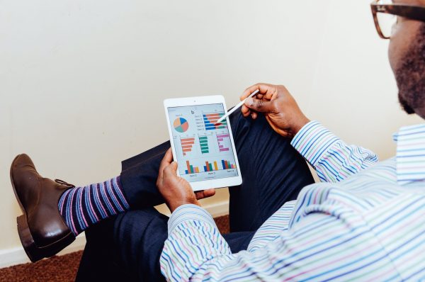 Man sitting and using tablet